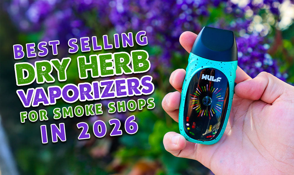 Man holding the Wulf Faze Dry Herb Vaporizer with purple flowers in background