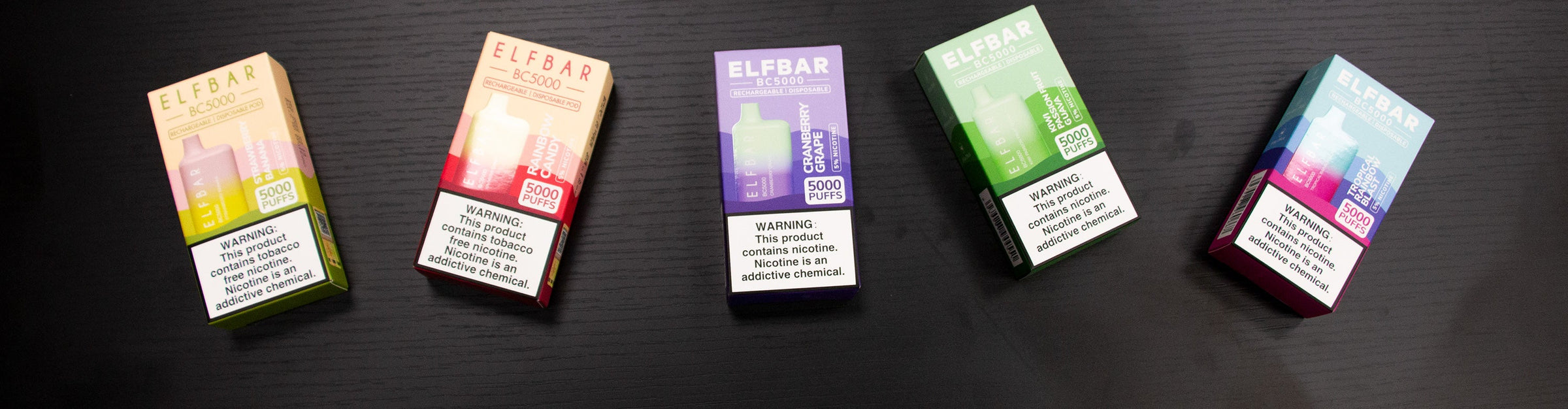 Wholesale Elf Bar Disposables laying down on black wooden office table